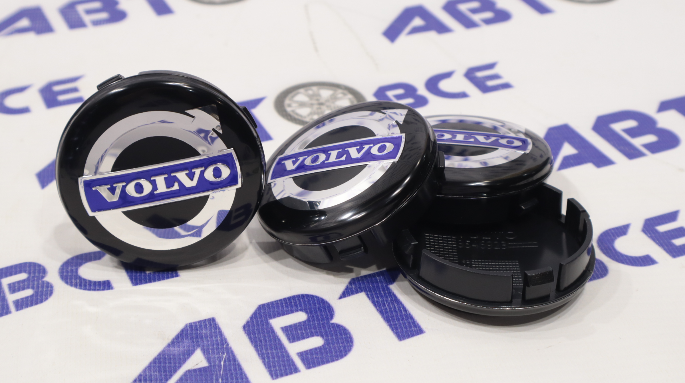 Колпачок ступицы (пластик) комплект 4шт Volvo черный (64мм)